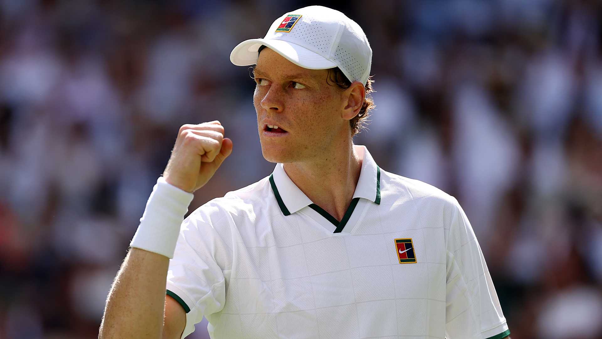Jannik Sinner in first-round action against Miomir Kecmanovic at Wimbledon on Monday.