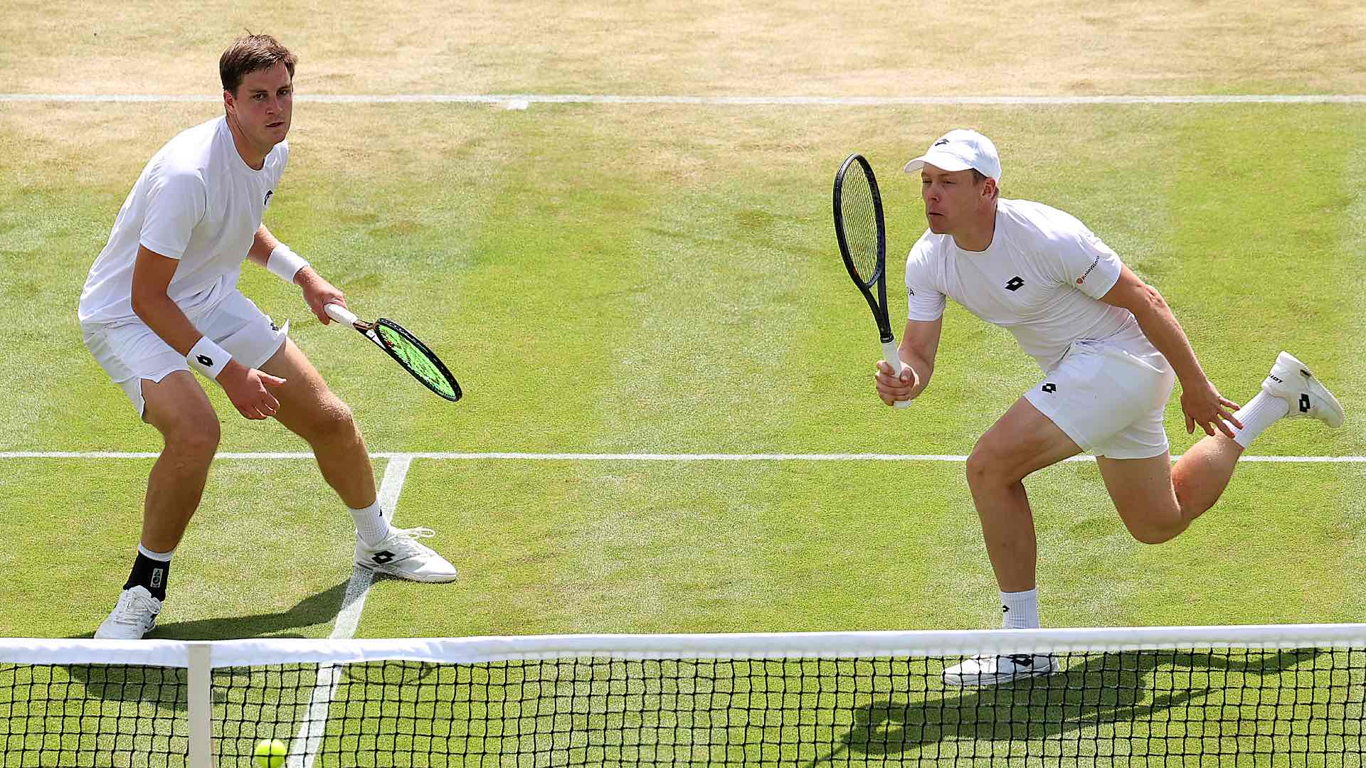 Top seeds Henry Patten and Harri Heliovaara in action at Wimbledon.