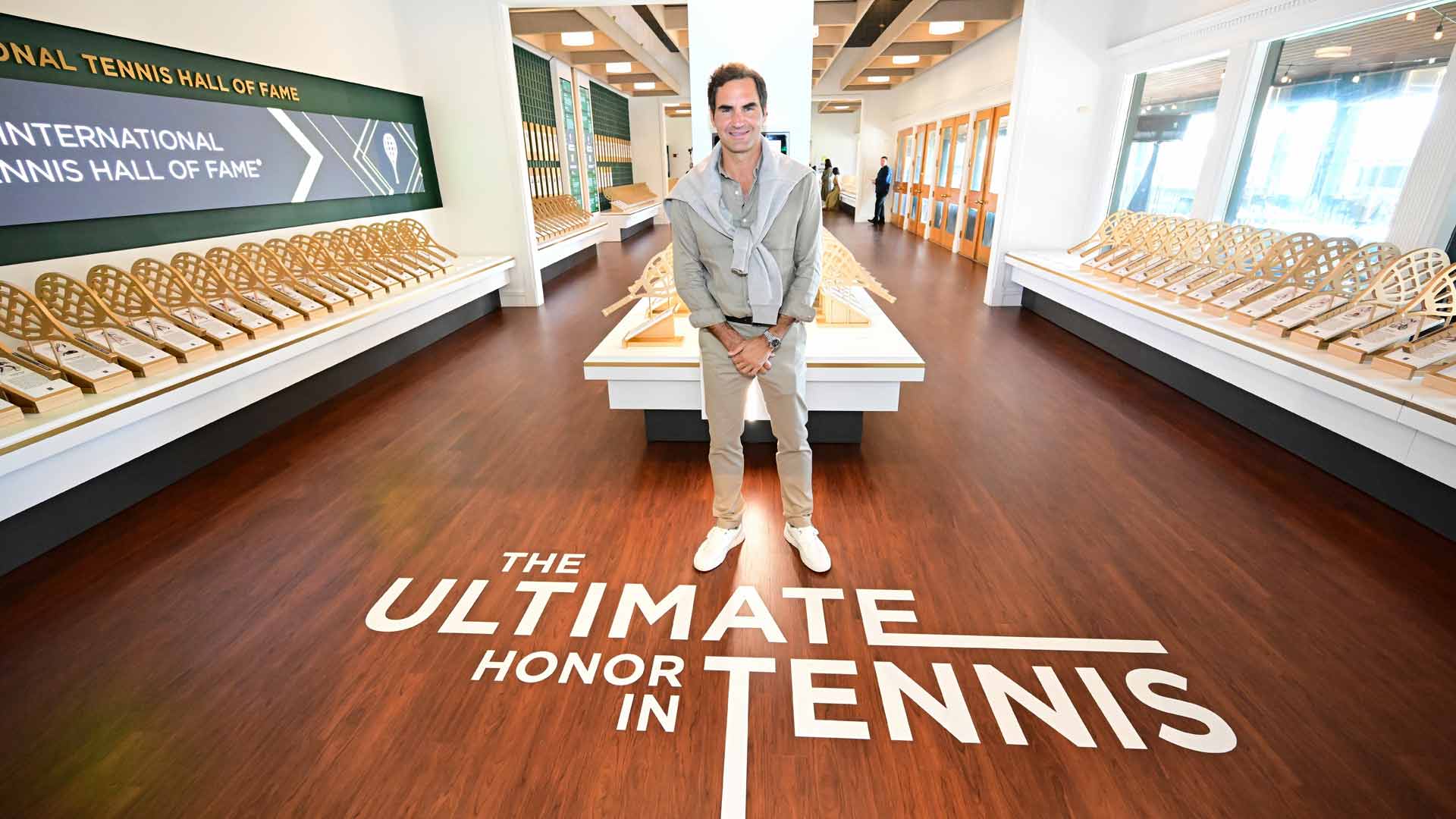 Roger Federer explores the International Tennis Hall of Fame Museum in Newport.